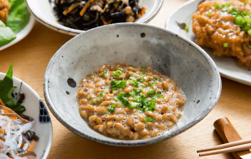 Natto is a traditional Japanese dish made from fermented soybeans. The fermentation process gives natto its characteristic slimy texture and strong smell. 