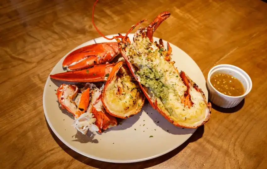 Lobster is actually quite a versatile seafood. It can be boiled, baked, grilled, or even fried. The lobster meat is white and tender with a slightly sweet taste.