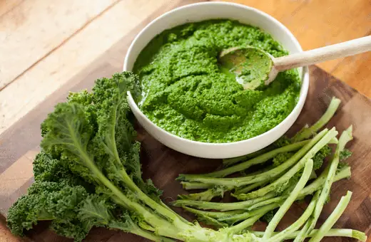 Kale pesto is a delicious, healthy alternative to traditional basil pesto. It has a slightly earthy flavor that is well balanced by the sweetness of the olive oil and the saltiness of the Parmesan cheese. 