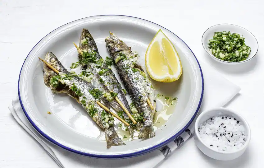 Sardines are small, oily fish with a strong flavor and are often canned and eaten as a food source 