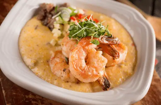As for taste, shrimp and grits are typically savory and slightly salty, with a creamy texture from the grits