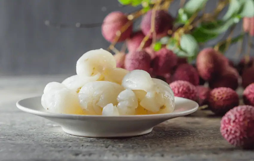 Lychee is a type of fruit that is native to Southeast Asia. The exterior of lychee fruit is rough and red, and the inside is juicy white flesh with a large seed. 