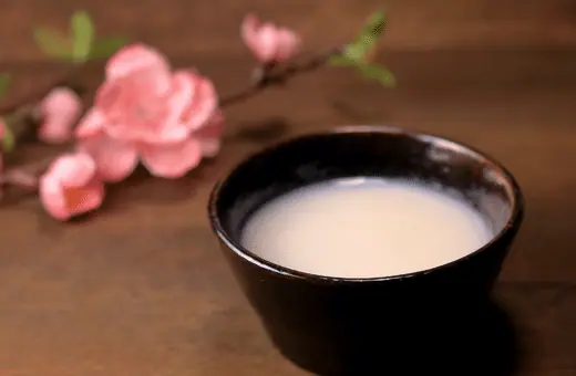 Nigori Sake is a type of unfiltered sake that has a cloudy appearance. It is made by allowing the rice lees, or sediments, to remain in the fermented mixture. 